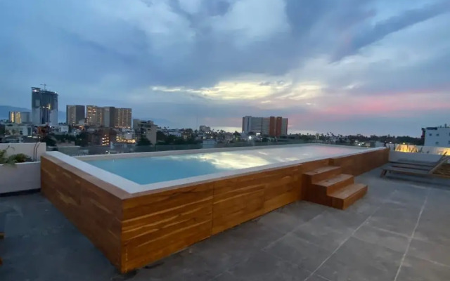 Serene Stylish Stay Roof Pool and Lounge