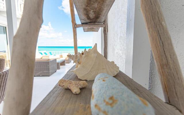 Caprice 5 -Private Beachfront Home in Gated Community