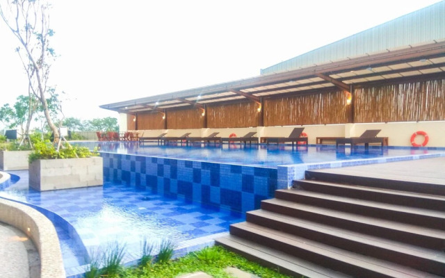 Warm And Simply Studio Room At Azalea Suites Apartment