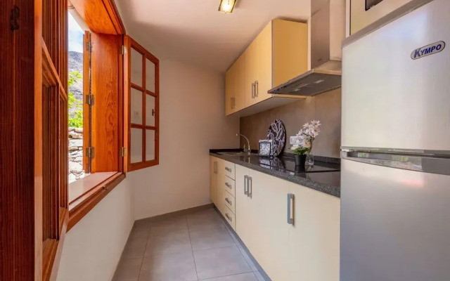 Casa de vacaciones con piscina compartida en Mogán II