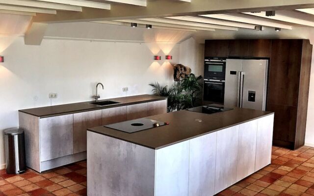 Lush Holiday Home in Oeffelt with 2 Saunas & Hot Tubs