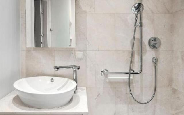 Design Central Studio Apartment with Balcony by Hostlovers