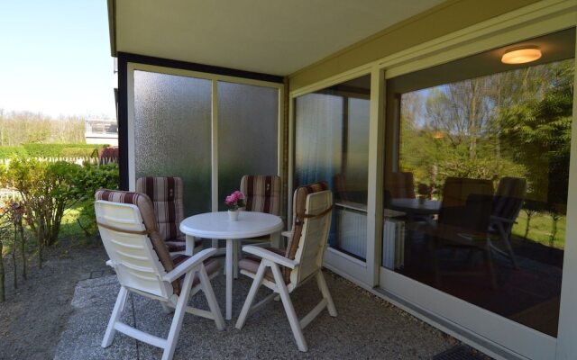 Apartment in Nieuwvliet with Roof Terrace, Garden, Parking