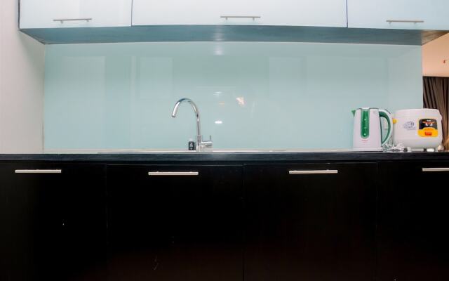 Comfy and Spacious 2BR The Masterpiece Epicentrum Apartment By Travelio