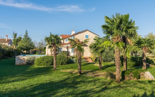 Newly built stone villa Mia with garden and pool