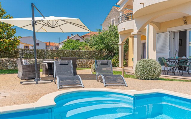 Nice Home in Pirovac With Wifi and 4 Bedrooms