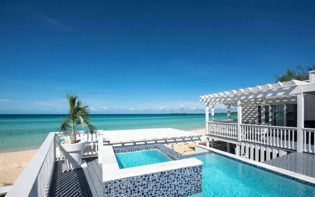 Secluded Luxury: New Beachfront Home With Pool