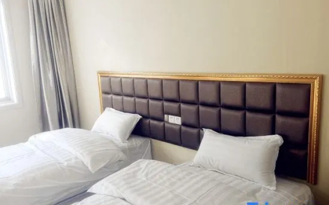 Zhengzhou Xinlong Fashion Hotel (Jicheng Temple Zhang Branch) – Guest Rooms – Zhengzhou
