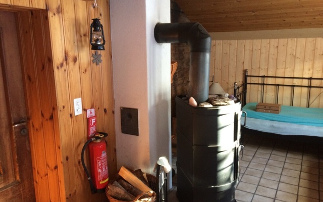 Swiss vYntage Chalets - 300 Year Old Swiss Chalet – Guest Rooms – Saxeten