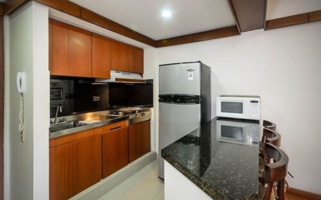 Travelers Suites Condominio Plenitud