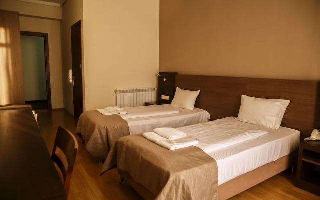 Olympus Hotel By Umbrella