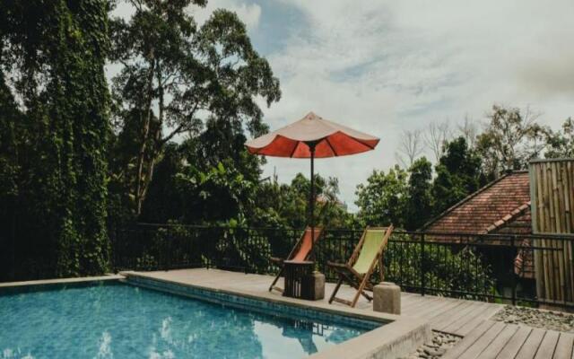 Sekar Arum Riverside Resort in Canggu by ZUZU
