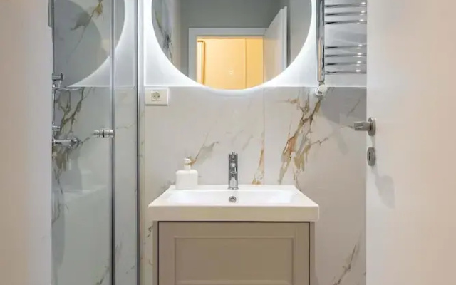 Elegant 3BR Flat Steps From Romanian Athenaeum