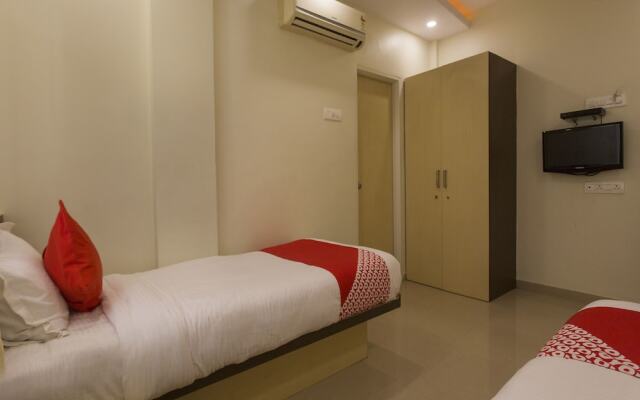 OYO 11566 Shree Swami Apartment