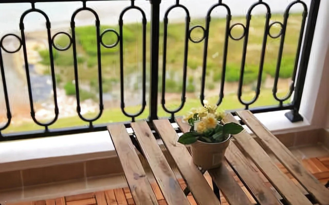 Yueming Holiday Apartment Hotel