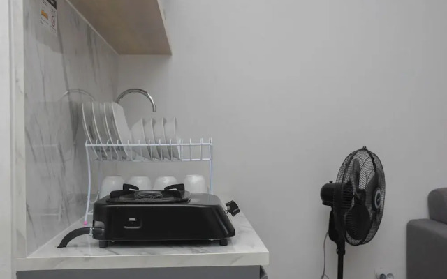 Cozy Style 2BR at Green Pramuka City Apartment