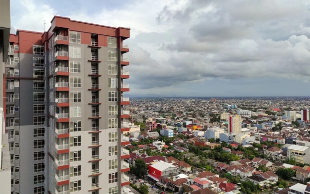 Elegant and Comfy 1BR at Vida View Makasar Apartment