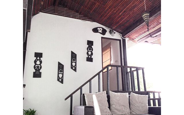 The Reef Hotel & Studios