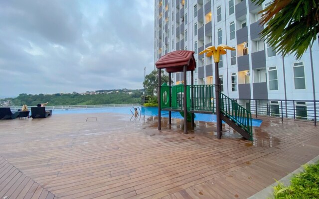 Homey And Cozy Living Studio Amartha View Apartment