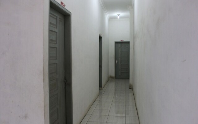 Penginapan Transit Tomato