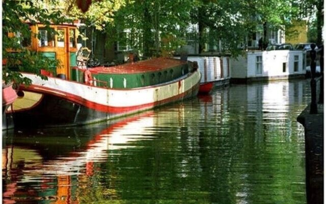 Houseboat in Amsterdam Old Center