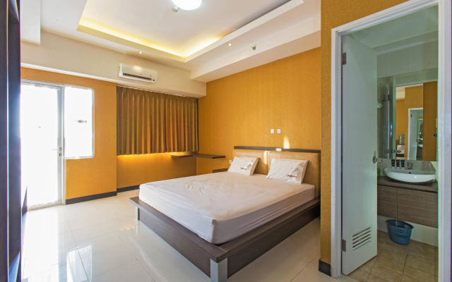 RedDoorz Apartment @ Seasons City