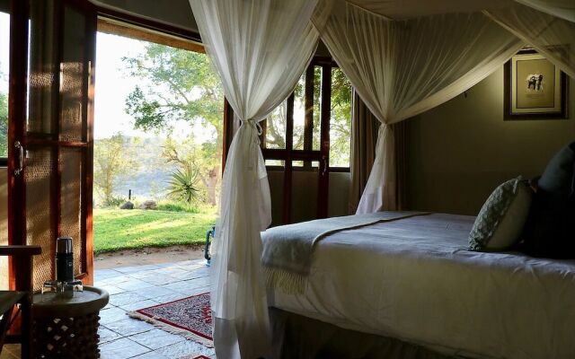 Ivory Wilderness River Rock Lodge