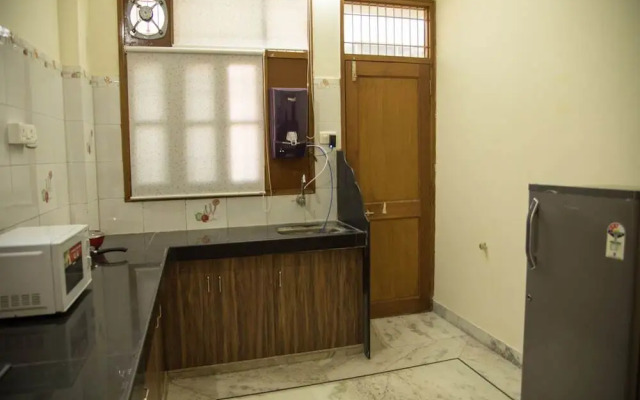 Urvi Apartments by OYO Rooms