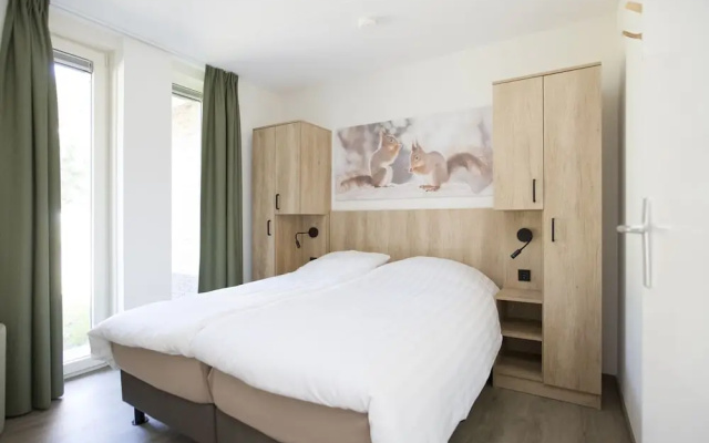 Attractive Bungalow with Covered Terrace near Veluwe