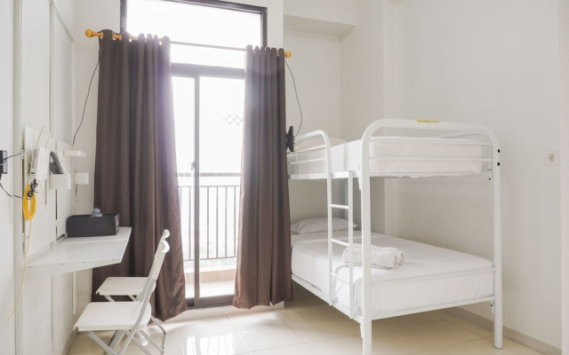 Homey and Cozy Living Studio Room at Dave Apartment