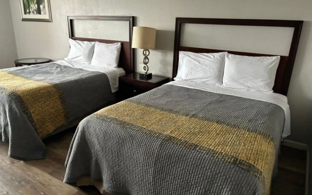 APM Inn and Suites