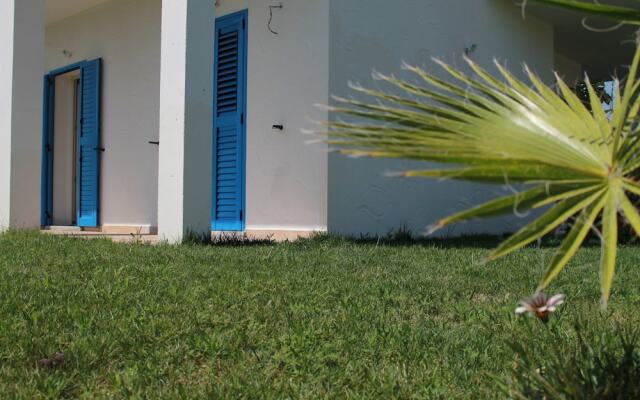 "room in Guest Room - S'olivariu Village Affittacamere - King Room With Roll-in Shower"