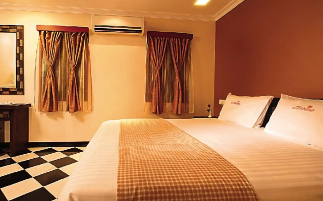 Meenakshi's Sunshine Hotel