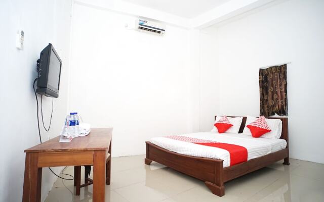 Pondok Mulia Guest House by OYO Rooms