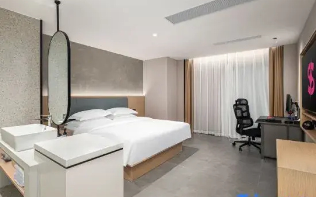 Xingtian Stellar Sparks Hotel (Wanxiang Mall Subway Station)