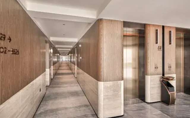 DongGuan Tangxia Vanke Plaza Huaman Hotel