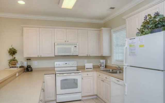 Magnolia Pointe 204 4879 2 Br condo by RedAwning