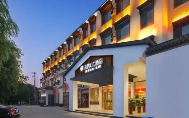 Xique CC Hotel (Xiayi Xuefeng East Road Bus Station)