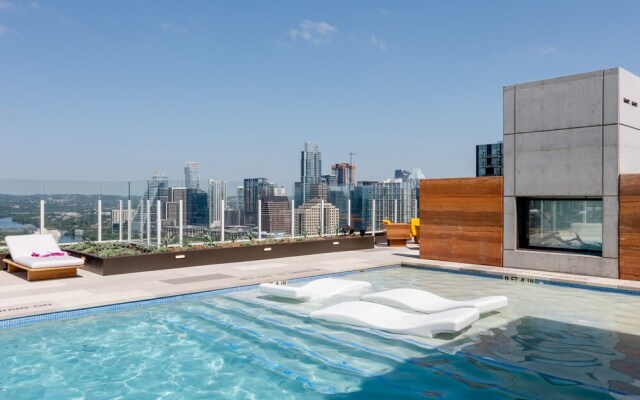 20th floor condo with pool on Rainey St by Locale
