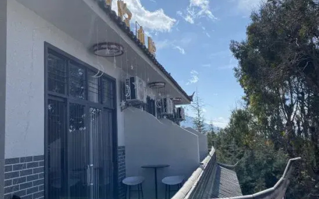 Lijiang Yuni Xiaoyuan Inn (Sanyi Airport)