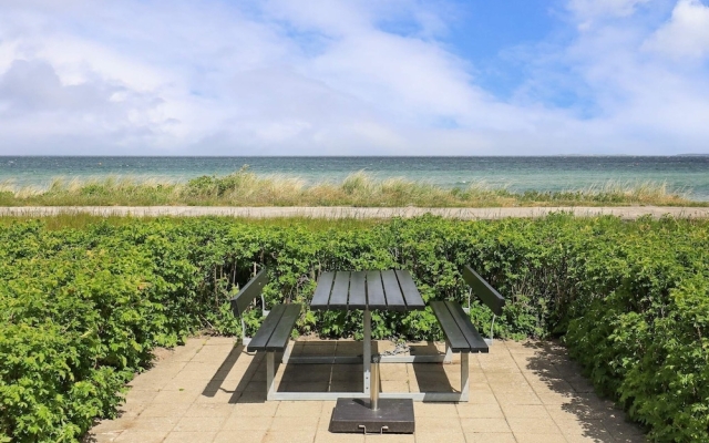 Seaside Serenity at Hasmark Beach-by Traum