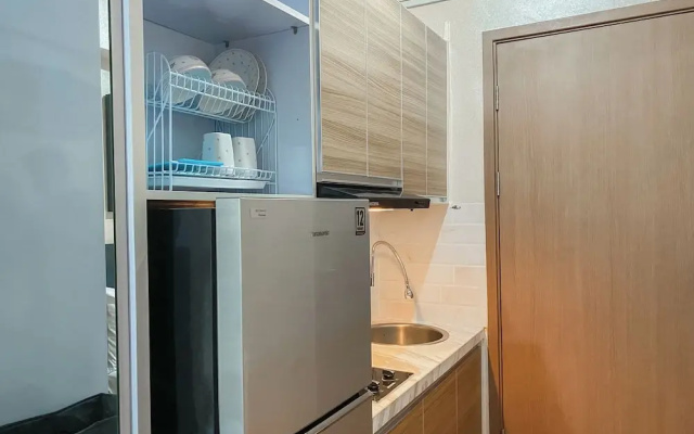 Warm and Homey Studio at Podomoro Golf View Apartment