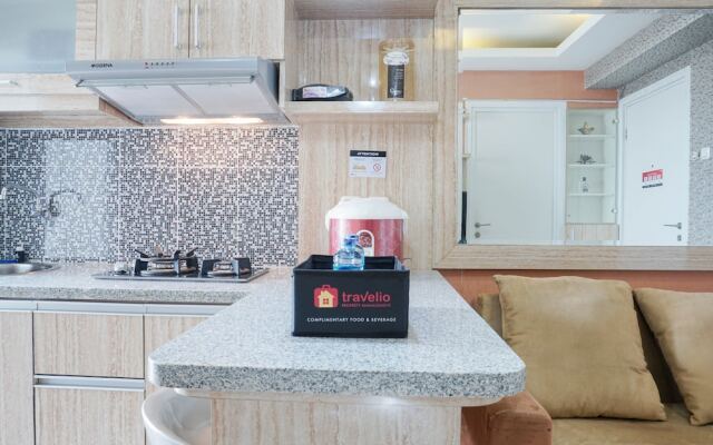 Homey and Fresh 2BR Green Pramuka Apartment