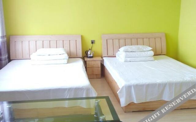 Pingdu New Home Business Hotel