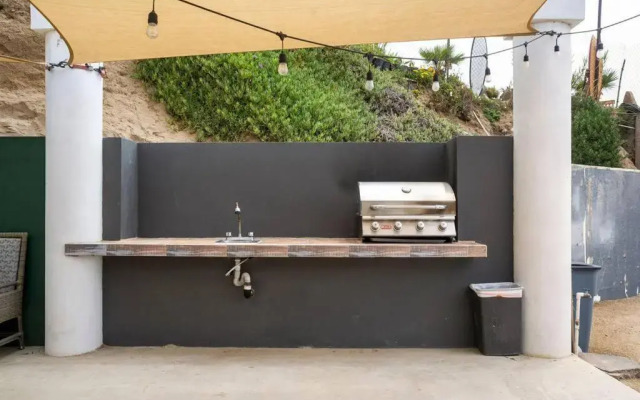 Triton's Playhouse Beachfront