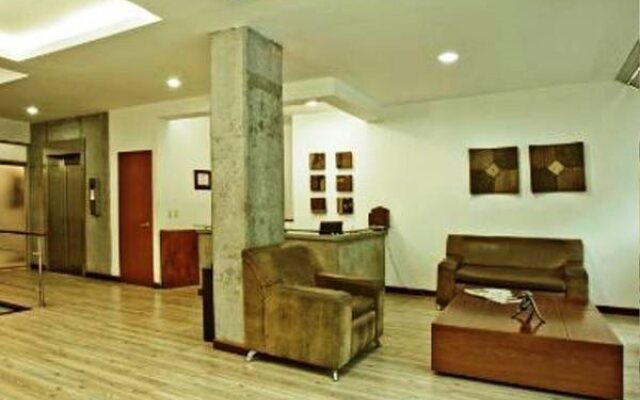 Hábitat Suites Hotel
