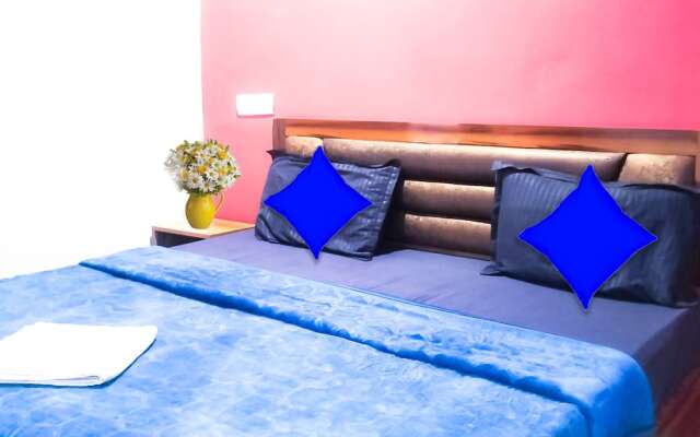 Roomshala 021 Hotel Joyous Inn