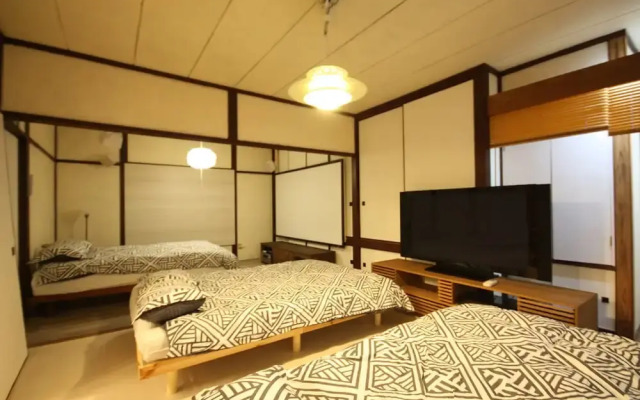 Sapporo Dome Front House