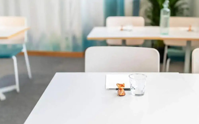 Inviting Hotel Room With Free Breakfast