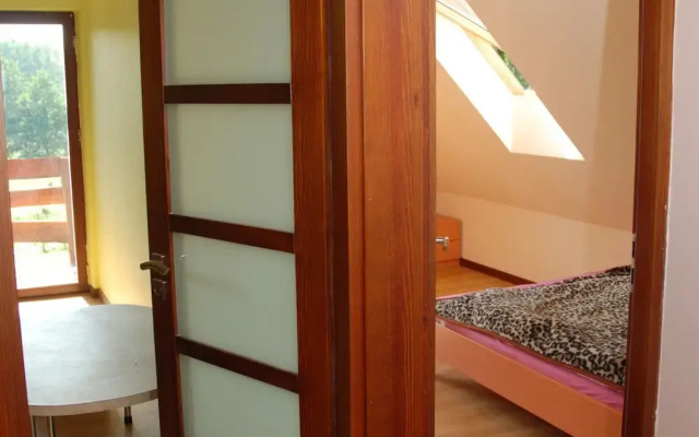 Rustic Riverside Cabin in Forest